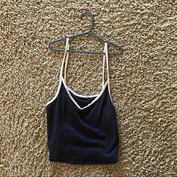 A black tank top with white straps - Picture 1 of 2